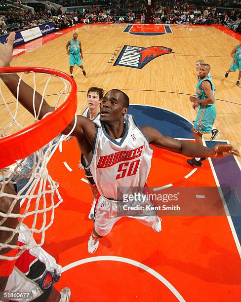 Emeka Okafor of the Charlotte Bobcats jumps in the air against the New Orleans Hornets December 14, 2004 at Charlotte Coliseum in Charlotte, North...
