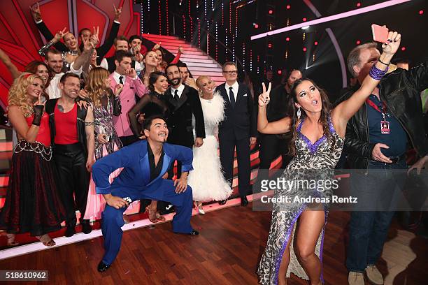Sarah Lombardi takes a selfie with her team mates during the 3rd show of the television competition 'Let's Dance' on April 1, 2016 in Cologne,...