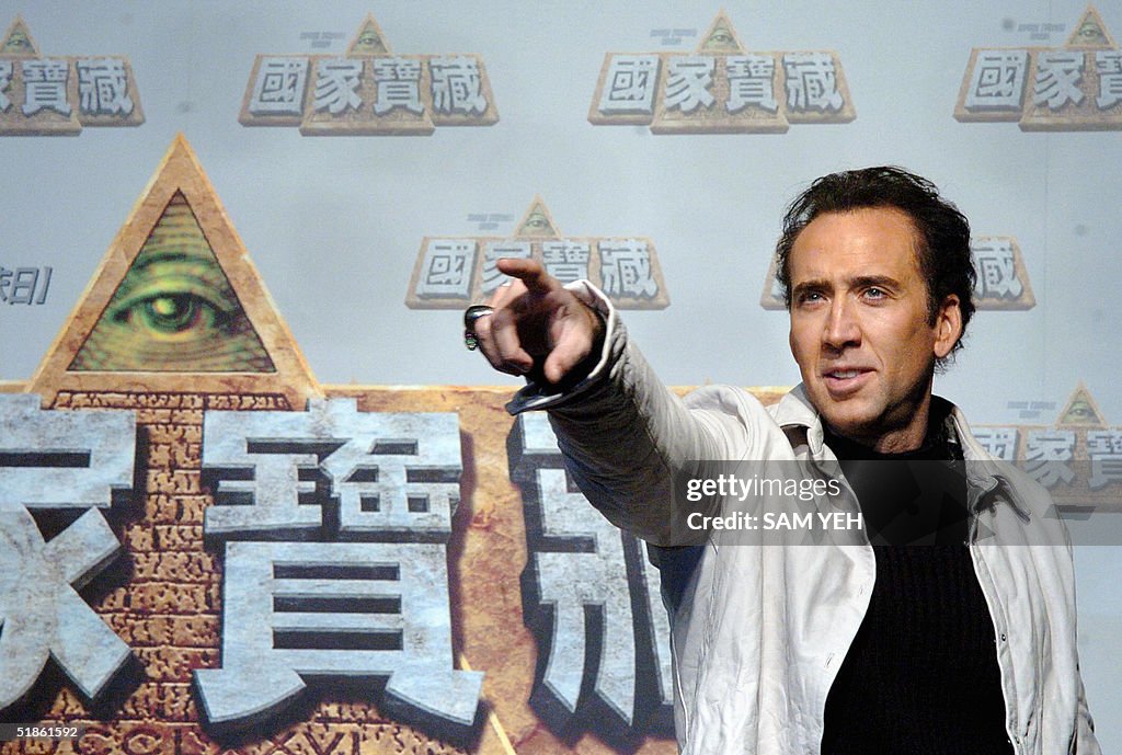 Hollywood actor Nicolas Cage gestures du