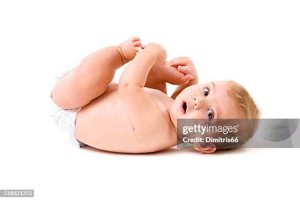 bambino isolato su bianco - supino foto e immagini stock