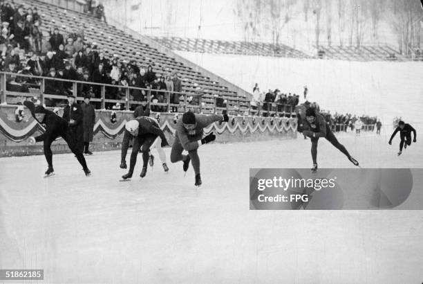 American skater Jack Shea crosses the finish line to win the second heat of the Men's 1500 Meter Speed Skating competition at the Winter Olympics in...