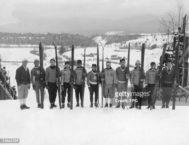 Group portrait of the American men's Olympic ski team seen on the opening day of the Winter Olympics in Lake Placid, New York, February 4, 1932. From...