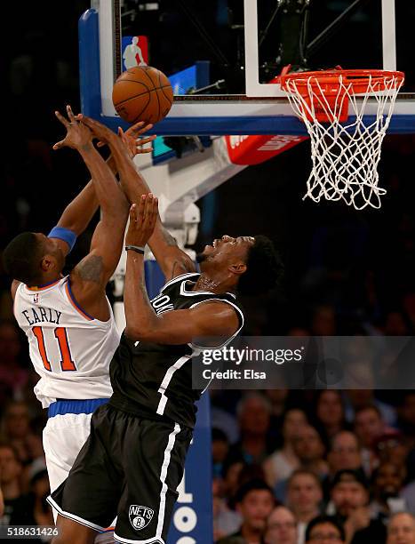 Cleanthony Early of the New York Knicks heads for the net as Henry Sims of the Brooklyn Nets defends at Madison Square Garden on April 1, 2016 in New...