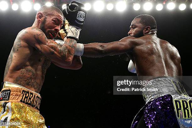 Ashley Theophane and Adrien Broner exchange punches in their super lightweight championship bout at the DC Armory on April 1, 2016 in Washington, DC.