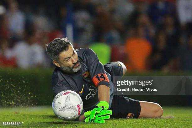 Vitor Baia of Barcelona Legends dives to stop the ball during the match between Leyendas de Mexico and FCB Legends at La Corregidora Stadium on april...