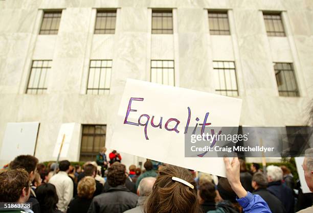 Supporters of Same Sex marriage in Oregon demonstrate on the steps of the State Capital Building December 15, 2004 in Salem, Oregon. The Oregon...