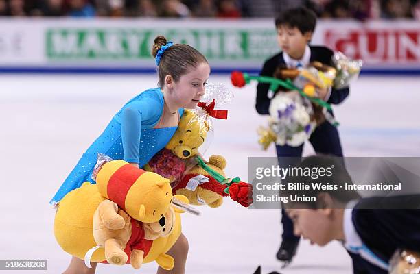Sweepers clear the ice of stuffed animals during Day 5 of the ISU World Figure Skating Championships 2016 at TD Garden on April 1, 2016 in Boston,...
