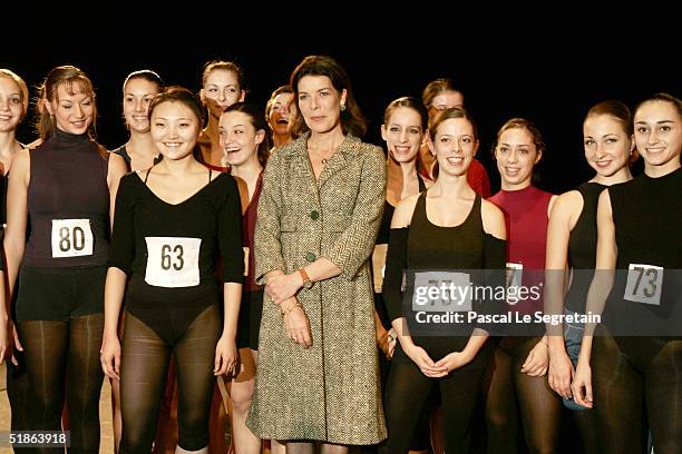 Princess Caroline of Hanover stands with students as she opens the Monaco Dance Forum December 15, 2004 in Monte Carlo, Monaco.