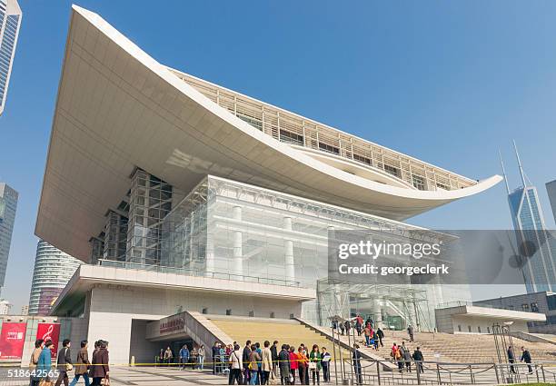 people visiting shanghai's grand theatre - peoples square stock pictures, royalty-free photos & images