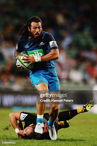 Rene Ranger of the Blues makes a break during the round 6 super rugby match between the Blues and the Jaguares at QBE Stadium on April 2, 2016 in...