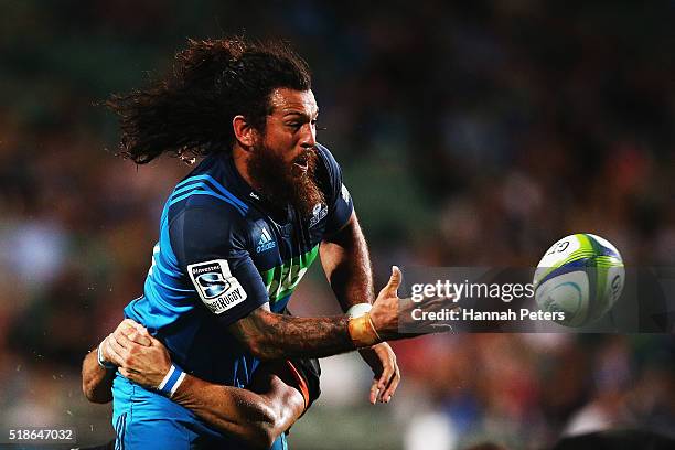 Rene Ranger of the Blues offloads the ball during the round 6 super rugby match between the Blues and the Jaguares at QBE Stadium on April 2, 2016 in...