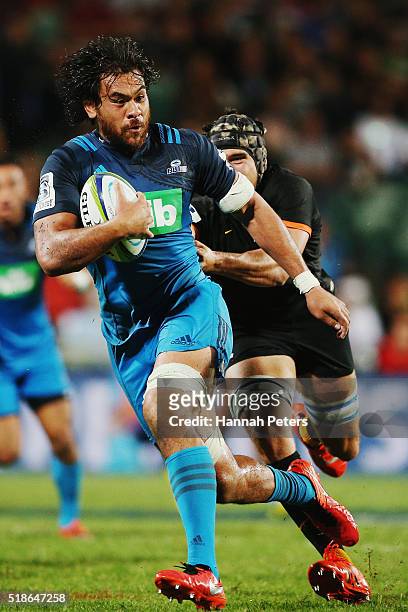 Steven Luatua of the Blues makes a break during the round 6 super rugby match between the Blues and the Jaguares at QBE Stadium on April 2, 2016 in...