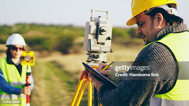 surveying - surveyor stock pictures, royalty-free photos & images