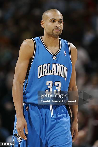 Grant Hill of the Orlando Magic walks on the court during the game against the Denver Nuggets on December 6, 2004 at Pepsi Center in Denver,...