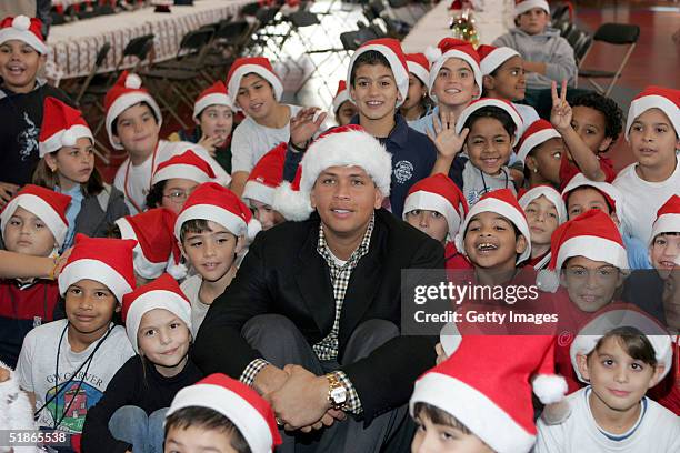 Baseball player Alex Rodriguez hosts a Christmas party at The Boys and Girls Clubs Of Miami on December 15, 2004 in Miami.