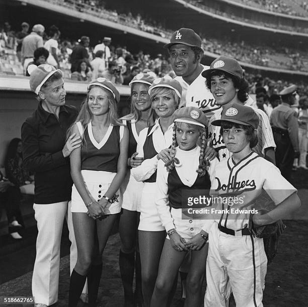 American baseball player Don Newcombe with the cast of the US TV sitcom 'The Brady Bunch', at a charity baseball game at Dodger Stadium, Los Angeles,...