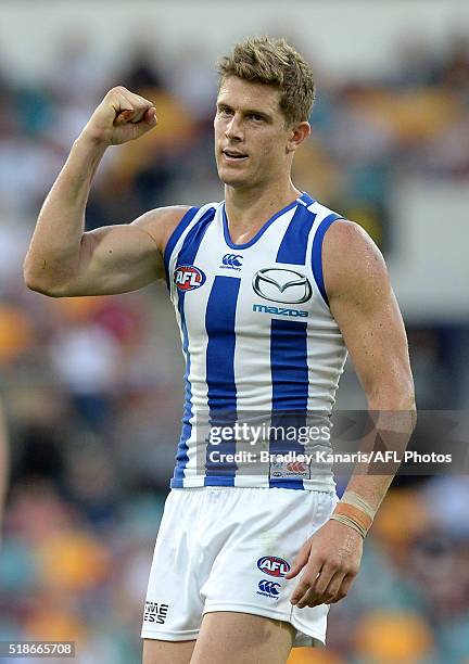 Nick Dal Santo of the Kangaroos celebrates after kicking a goal during the round two AFL match between the Brisbane Lions and the North Melbourne...