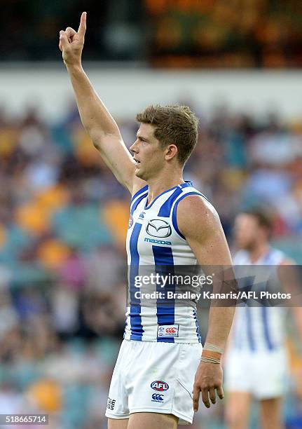 Nick Dal Santo of the Kangaroos celebrates after kicking a goal during the round two AFL match between the Brisbane Lions and the North Melbourne...