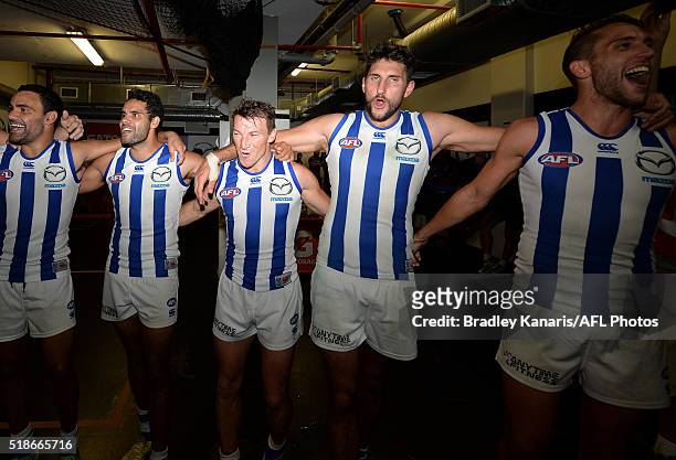 Brent Harvey of the Kangaroos and team mates celebrate their victory after the round two AFL match between the Brisbane Lions and the North Melbourne...
