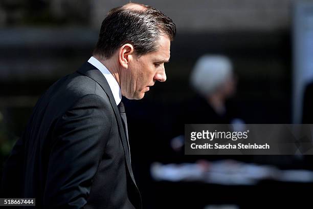 Michael Mronz arrives for the memorial commemoration for his husband and late German politician Guido Westerwelle at the Sankt Aposteln Kirche church...