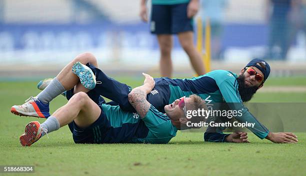 Moeen Ali of England is tackled by Jason Roy of England during a nets session ahead of tomorrrow's ICC World Twenty20 India 2016 Final between...