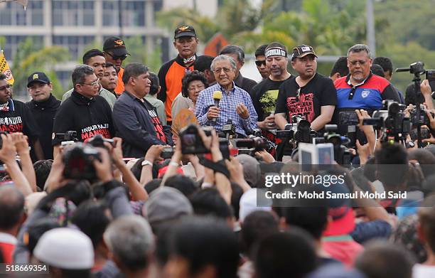 Former Malaysian prime minister Mahathir Mohamad gives a speech during a rally against Prime Minister Najib Razak and GST at Independent Square on...