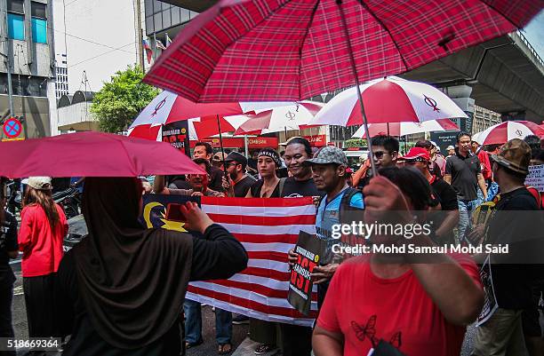 Protesters walk to Independent Square during a rally against Prime Minister Najib Razak and GST on April 2, 2016 in Kuala Lumpur, Malaysia. Almost...