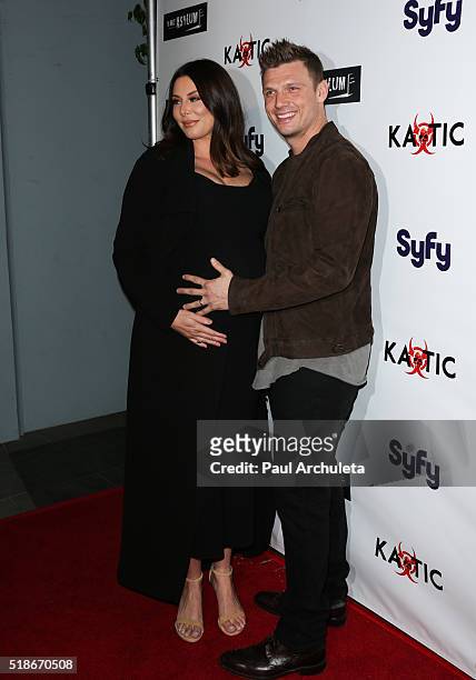 Actress Lauren Kitt and Singer Nick Carter attend the premiere of Syfy's "Dead 7" at Harmony Gold on April 1, 2016 in Los Angeles, California.