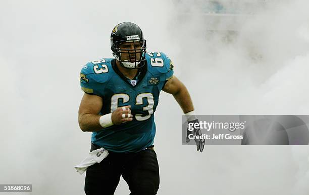 Center Brad Meester of the Jacksonville Jaguars runs onto the field before facing the Detroit Lions at Alltel Stadium on November 14, 2004 in...