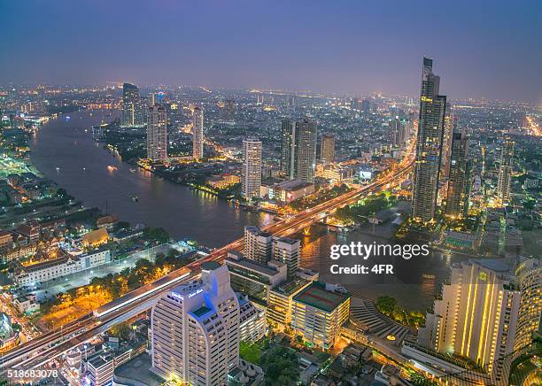 bangkok skyline at sunset - menam stockfoto's en -beelden