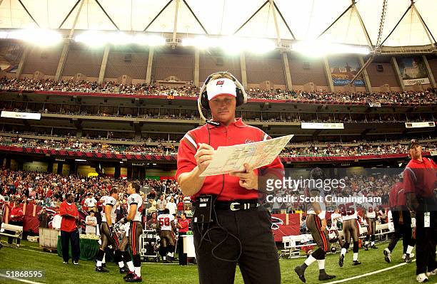 Tampa Bay Buccaneers Head Coach Jon Gruden prepares for the game against the Atlanta Falcons. The Buccaneers won the game 31-10 on September 21, 2003.
