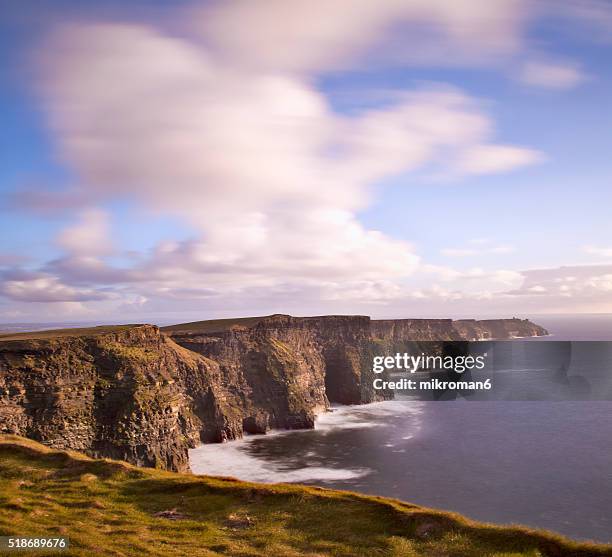 cliffs of moher sunset time - costal surface human lung stock pictures, royalty-free photos & images