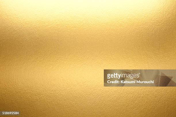 gold paper texture background - gilded fotografías e imágenes de stock