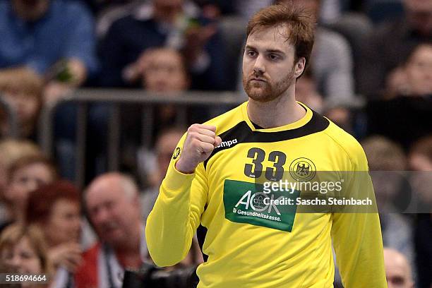 Goalkeeper Andreas Wolff of Germany reacts during the Handball international friendly match between Germany and Denmark at Lanxess Arena on April 2,...