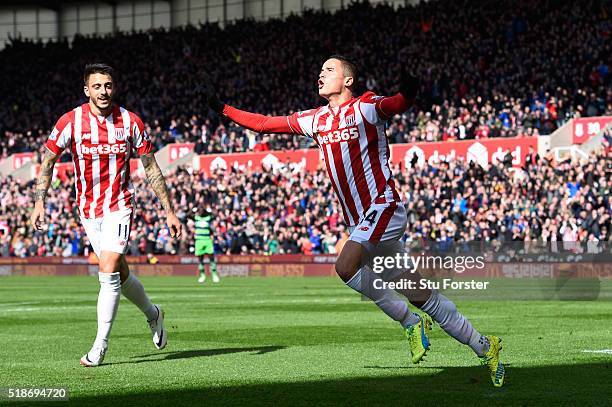 Ibrahim Afellay of Stoke City celebrates scoring his team's first goal during the Barclays Premier League match between Stoke City and Swansea City...