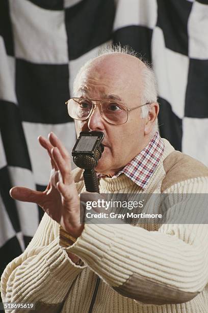 Portrait at the microphone of commentator Murray Walker on 2 February 1993 at the Allsport studio in Colliers Wood, London, England.