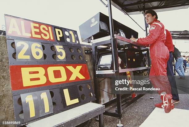 Jean Alesi of France, driver of the Scuderia Ferrari Ferrari F93A Ferrari V12 in the pit box during practice for the Italian Grand Prix on 11th...