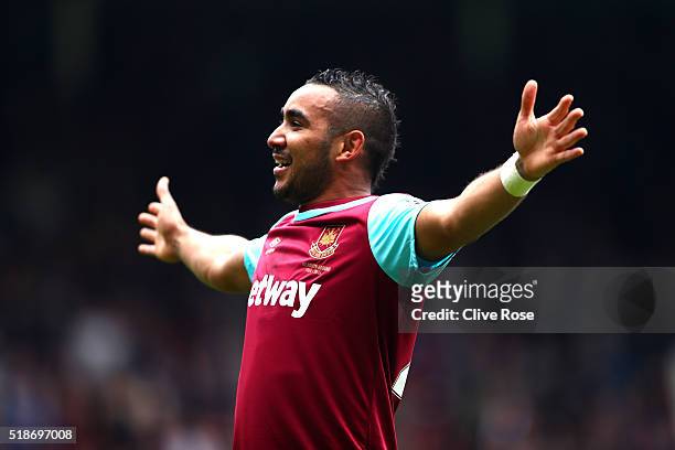 Dimitri Payet of West Ham United celebrates scoring his team's second goal during the Barclays Premier League match between West Ham United and...
