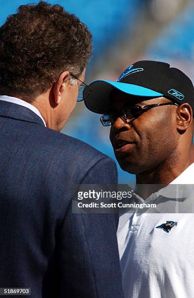 Carolina Panthers Linebackers Coach Sam Mills speaks with NFL Commissioner Paul Tagliabue before the game against the Tennessee Titans. The Titans...