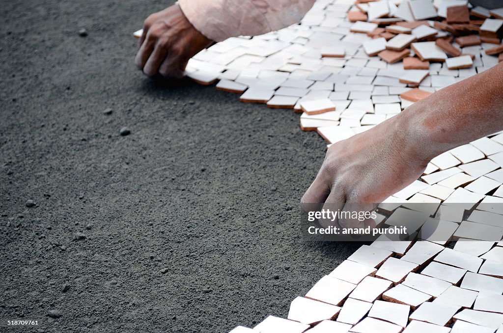 Doing china mosaic on terrace of home