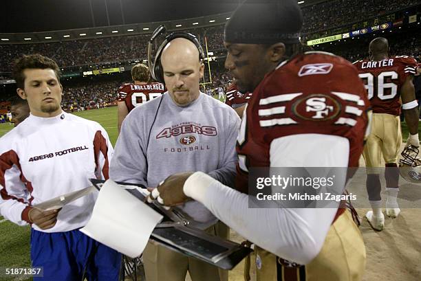 San Francisco 49ers coach Dan Quinn with defensive end Chidi Ahanotu at 3Com Park on November 17, 2003 in San Francisco, CA. The San Francisco 49ers...