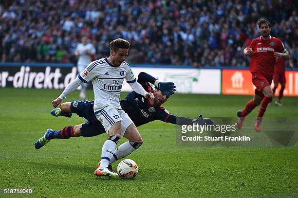 Nicolai Müller of Hamburg scores his goal during the Bundesliga match between Hannover 96 and Hamburger SV at HDI-Arena on April 2, 2016 in Hanover,...
