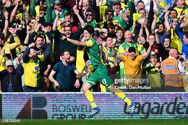 Timm Klose of Norwich City celebrates scoring his team's first goal during the Barclays Premier League match between Norwich City and Newcastle...