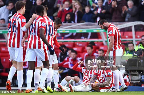 Bojan Krkic of Stoke City celebrates scoring his team's second goal with his team mates during the Barclays Premier League match between Stoke City...