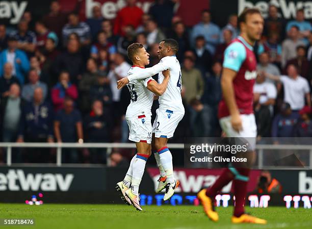 Dwight Gayle of Crystal Palace celebrates scoring his team's second goal with his team mate Jason Puncheon during the Barclays Premier League match...