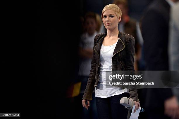 Reporter Anett Sattler is seen after the Handball international friendly match between Germany and Denmark at Lanxess Arena on April 2, 2016 in...