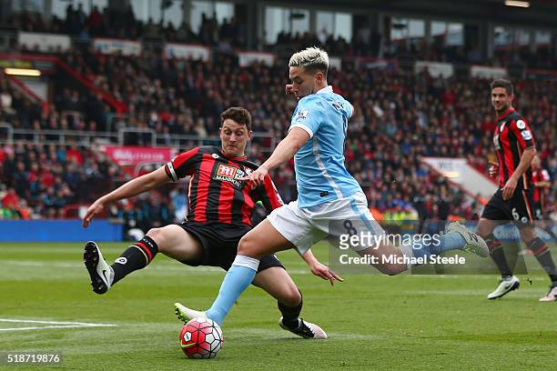 Tommy Elphick of Bournemouth tries to block a shot by Samir Nasri of Manchester City during the Barclays Premier League match between A.F.C....