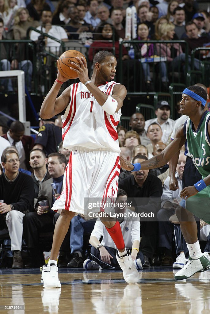 T Mac Rockets Tracy McGrady of the Houston Rockets is defended by Josh Howard of ...