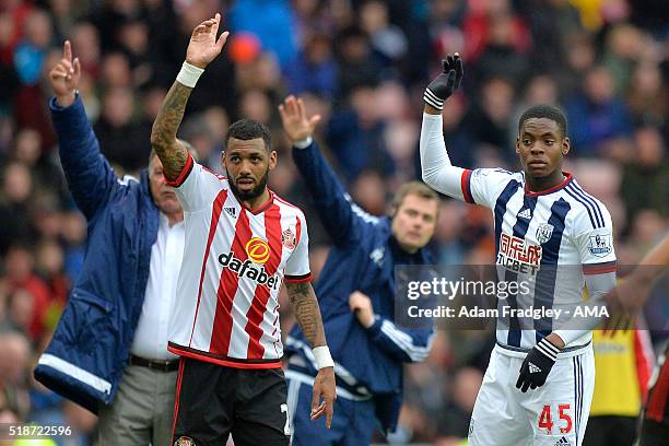 Jonathan Leko of West Bromwich Albion and Yann M'Vila of Sunderland gesture during the Barclays Premier League match between Sunderland and West...