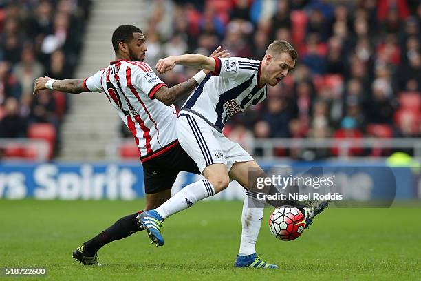 Darren Fletcher of West Bromwich Albion controls the ball under pressure of Yann M'Vila of Sunderland during the Barclays Premier League match...